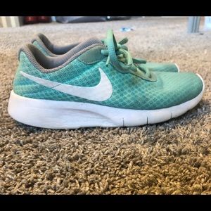 Light blue/teal Nike sneakers
